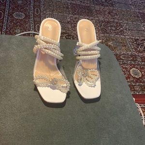Classy white heels brand new, never worn